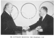 Dr Guttmann receiving the Fearnley Cup from the IOC in 1956, presented by Sir Arthur Porritt