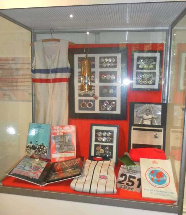 A display of Paul Cartwrights Paralympic medals, sports kit, photos.