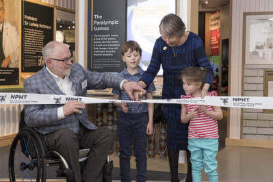 Sir Philip Craven, Eva Loeffler and Dr Guttmanns great grandchildren cut the ribbon at the official opening.