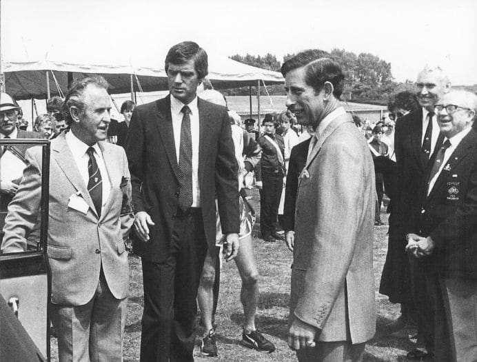Monochrome picture of Prince Charles at the Stadium with Douglas Joss