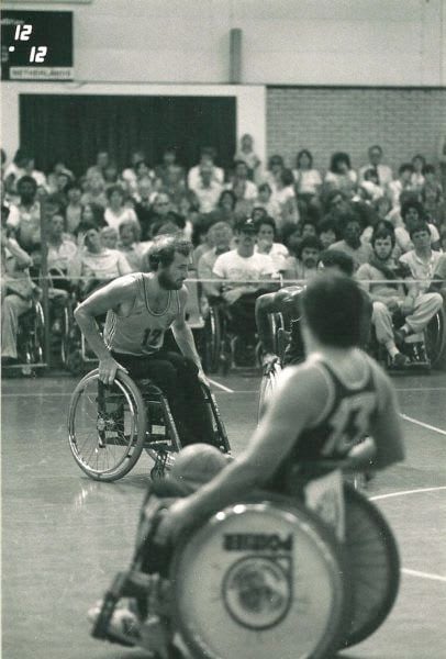 Sir Philip Craven playing wheelchair basketball in 1984