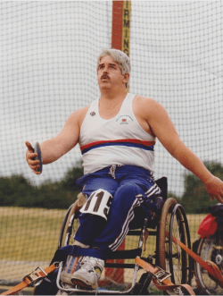 Kevan Baker competing in the discus at the Stoke Mandeville 1984 Paralympic Games