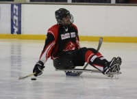 Dave from The Peterborough Phantoms Sledge Hockey Club on the ice
