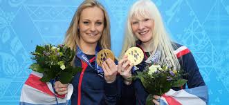 Kelly Gallagher and her Guide Charlotte Evans with the Gold medals, in the Alpine Skiing Super G event, Sochi 2014