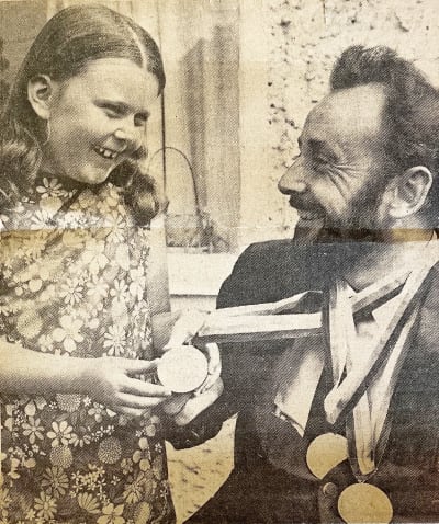 Alan West with his daughter Diane returning with his medals from the Heidelberg 1972 Paralympics
