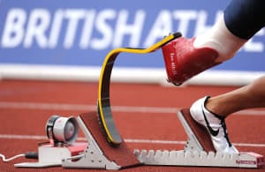 The Cheetah running blade, manufactured by Ossur, in the starting block on an athletics race track