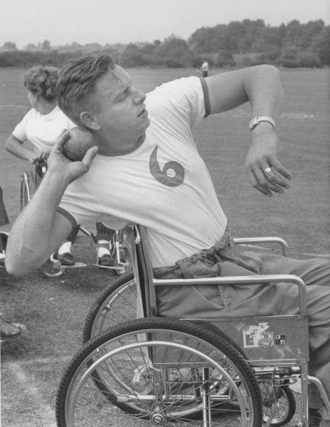 Dick Thompson competing in the shot put at Stoke Mandeville Stadium