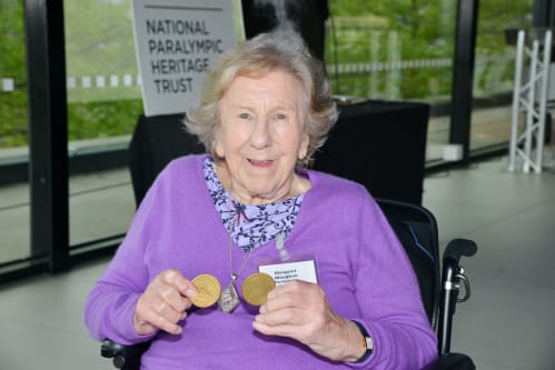 Margaret Maughan at a National Paralympic Heritage Trust event with her gold medals from the Rome Paralympic Games in 1960.
