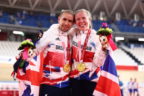 Paralympic cyclists, Lora and Neil Fachie celebrating both winning gold medals at the Tokyo 2020 Paralympic Games