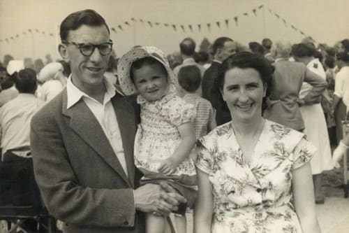 Mary and Jimmy Brennan, both nurses at the hospital, with their daughter watching the 1955 Games at Stoke Mandeville. 