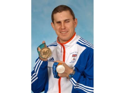 Ian Rose with his 1996 Atlanta bronze medal and 2004 Athens silver medal